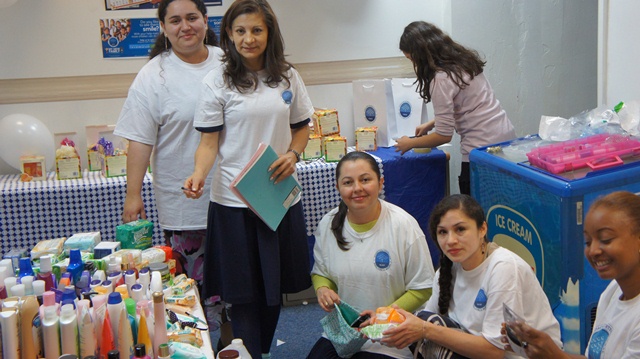Volunteers from England prepare first donations for India